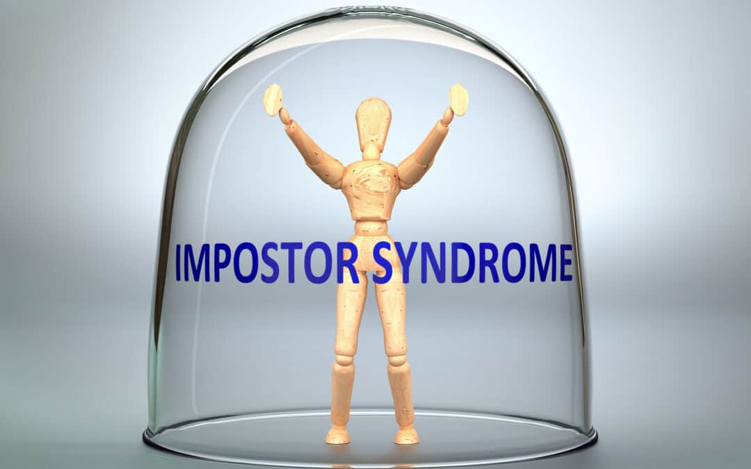 Impostor syndrome can separate a person from the world and lock in an isolation that limits - pictured as a human figure locked inside a glass with the phrase Impostor syndrome, 3d illustration.